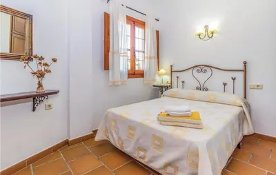 Cama o camas de una habitación en Holiday Home Periana - 03
