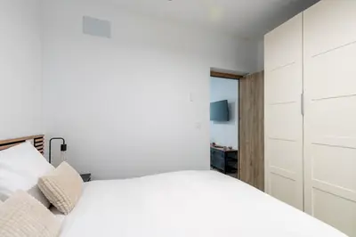 Cama o camas de una habitación en Pesquera Suites