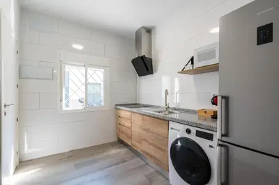 Una cocina o zona de cocina en Pesquera Suites