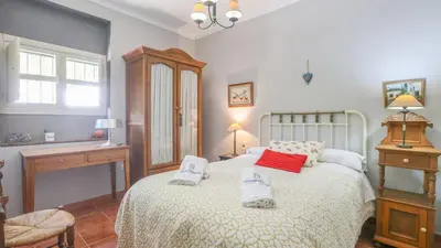 Cama o camas de una habitación en Finca El Olivo Llorón Montilla by Ruralidays