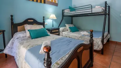 Cama o camas de una habitación en Puerto Nuevo by Ruralidays