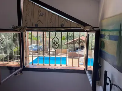 Piscina en o cerca de Relax y piscina privada para familias