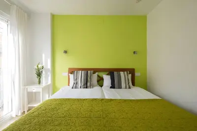 Cama o camas de una habitación en Veoapartment Feria 80