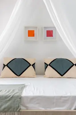 Cama o camas de una habitación en One&Lux Amador de los Ríos