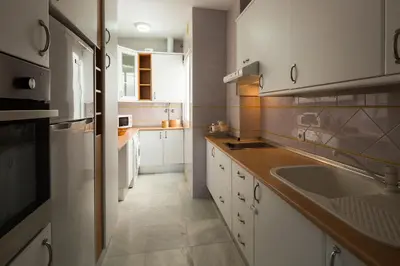 Una cocina o zona de cocina en Veoapartment Menéndez Terraza