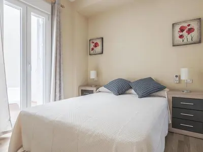 Cama o camas de una habitación en 2 Dorm Elegante en la Sevilla más autentica