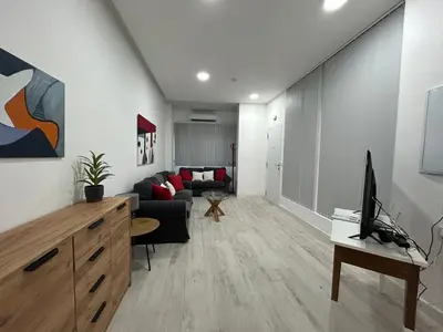Una televisión o centro de entretenimiento en Apartamento Loft Cervantes