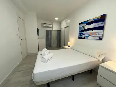 Cama o camas de una habitación en Apartamento Loft Cervantes
