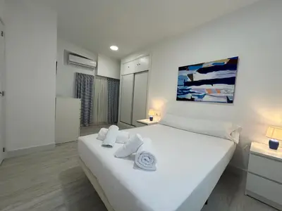 Cama o camas de una habitación en Apartamento Loft Cervantes