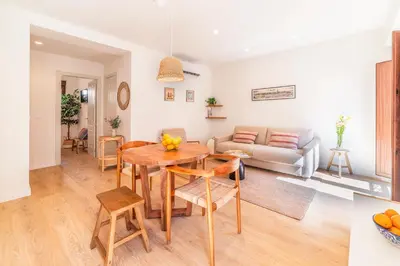 Zona de estar de Céntrico apartamento con piscina