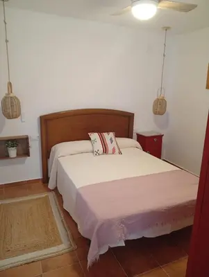 Cama o camas de una habitación en Casa Rural la Sierra del Viento