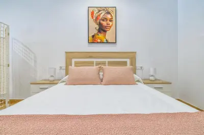 Cama o camas de una habitación en New Lofts Boutique Center Córdoba