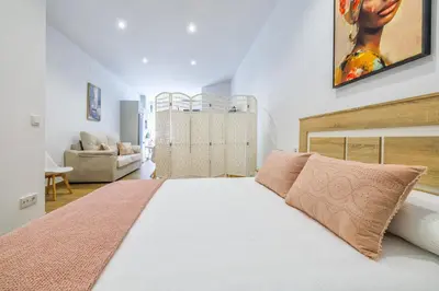 Cama o camas de una habitación en New Lofts Boutique Center Córdoba