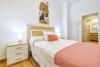 Cama o camas de una habitación en New Lofts Boutique Center Córdoba