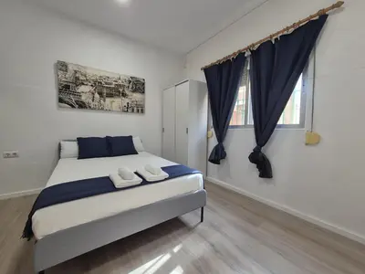 Cama o camas de una habitación en Casa Deluxe Gran Plaza