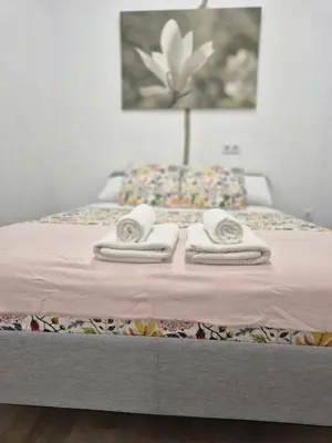 Cama o camas de una habitación en Casa Deluxe Gran Plaza