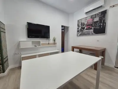 Una televisión o centro de entretenimiento en Casa Deluxe Gran Plaza