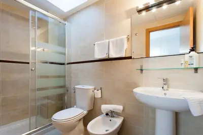 Un baño de Apartamentos San Leandro Ensenada
