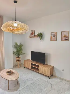 Una televisión o centro de entretenimiento en HC Luxe
