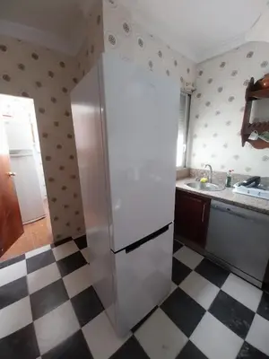 Una cocina o zona de cocina en Habitación F Aire Acondicionado y balcón