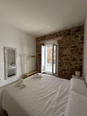 Cama o camas de una habitación en Apartamentos Puerta los Castañares B