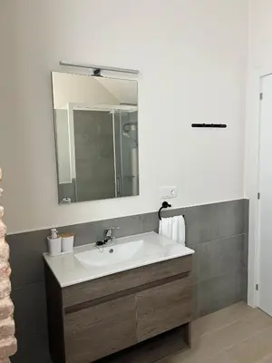 Un baño de Apartamentos Puerta los Castañares B