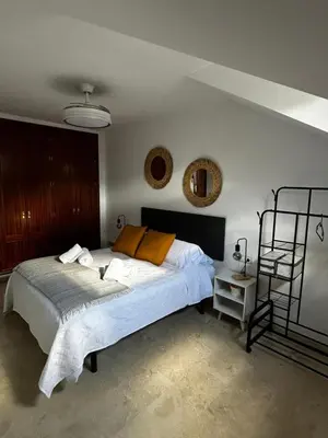 Cama o camas de una habitación en Luz del Sur