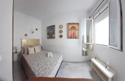 Cama o camas de una habitación en Budget and lovely apartments Sevilla center