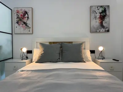Cama o camas de una habitación en Loft Avenida América
