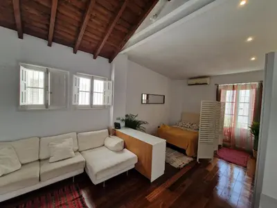 Zona de estar de Loft luz del Duque
