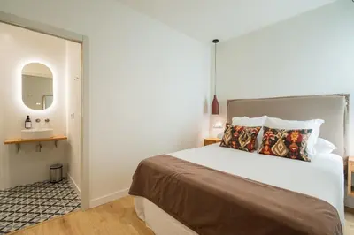 Cama o camas de una habitación en Los Patios de Feria - Sueño Andaluz