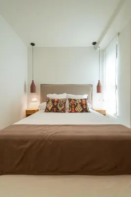 Cama o camas de una habitación en Los Patios de Feria - Sueño Andaluz