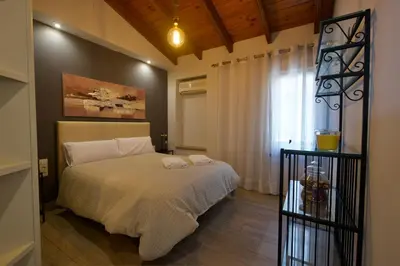 Cama o camas de una habitación en Apartamentos Turisticos Ilusiones 2