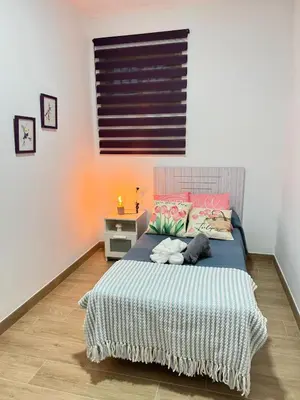 Cama o camas de una habitación en Casa en Villa Romero