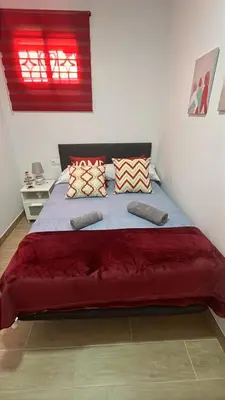 Cama o camas de una habitación en Casa en Villa Romero