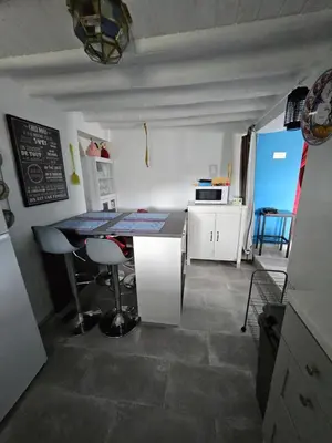 Una cocina o zona de cocina en Le petit paradis de Nicole