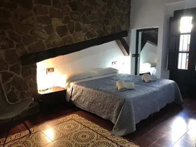 Cama o camas de una habitación en Casa Cortijo