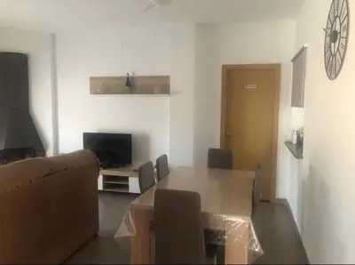 Una televisión o centro de entretenimiento en Casa Rural Pozo