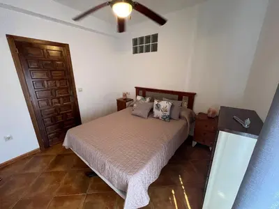 Cama o camas de una habitación en Casa rural El Carmen