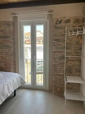 Cama o camas de una habitación en Puerta de los Castañares A