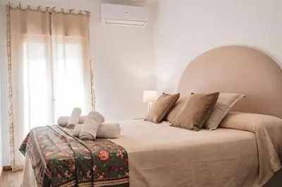Cama o camas de una habitación en Casa de los Abuelos en Baeza