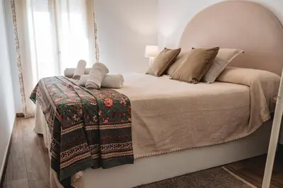 Cama o camas de una habitación en Casa de los Abuelos en Baeza