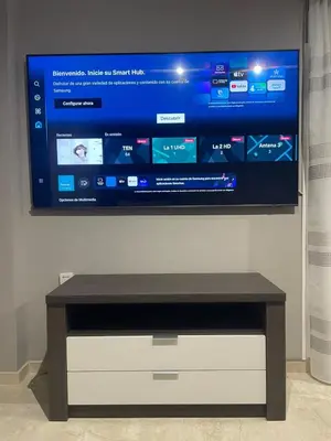 Una televisión o centro de entretenimiento en Apartamento Alameda Centro