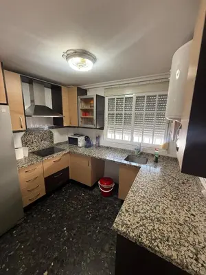Una cocina o zona de cocina en Apartamento Familiar