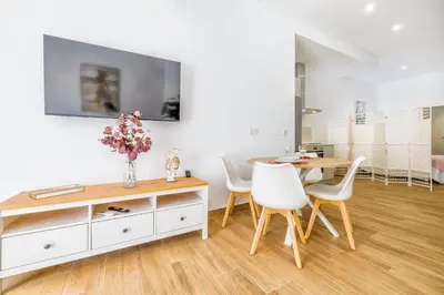 Una televisión o centro de entretenimiento en Loft con Encanto en Plaza Gonzalo de Ayora & Centro de Córdoba