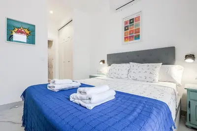 Cama o camas de una habitación en Modern and Cozy Apartment, Nervión Seville bajo B