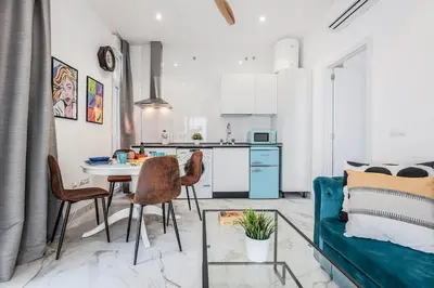 Una cocina o zona de cocina en Modern and Cozy Apartment, Nervión Seville bajo B