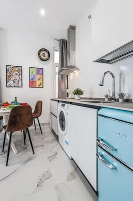 Una cocina o zona de cocina en Modern and Cozy Apartment, Nervión Seville bajo B