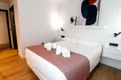 Cama o camas de una habitación en Geysotur Ribera Luxury Suites