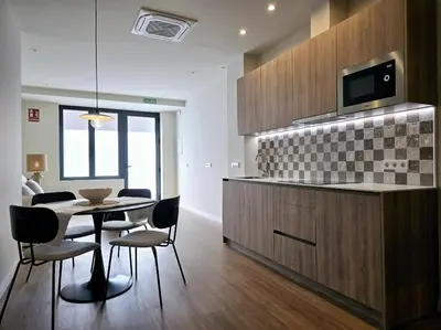 Una cocina o zona de cocina en Lhome Macarena Centro Histórico